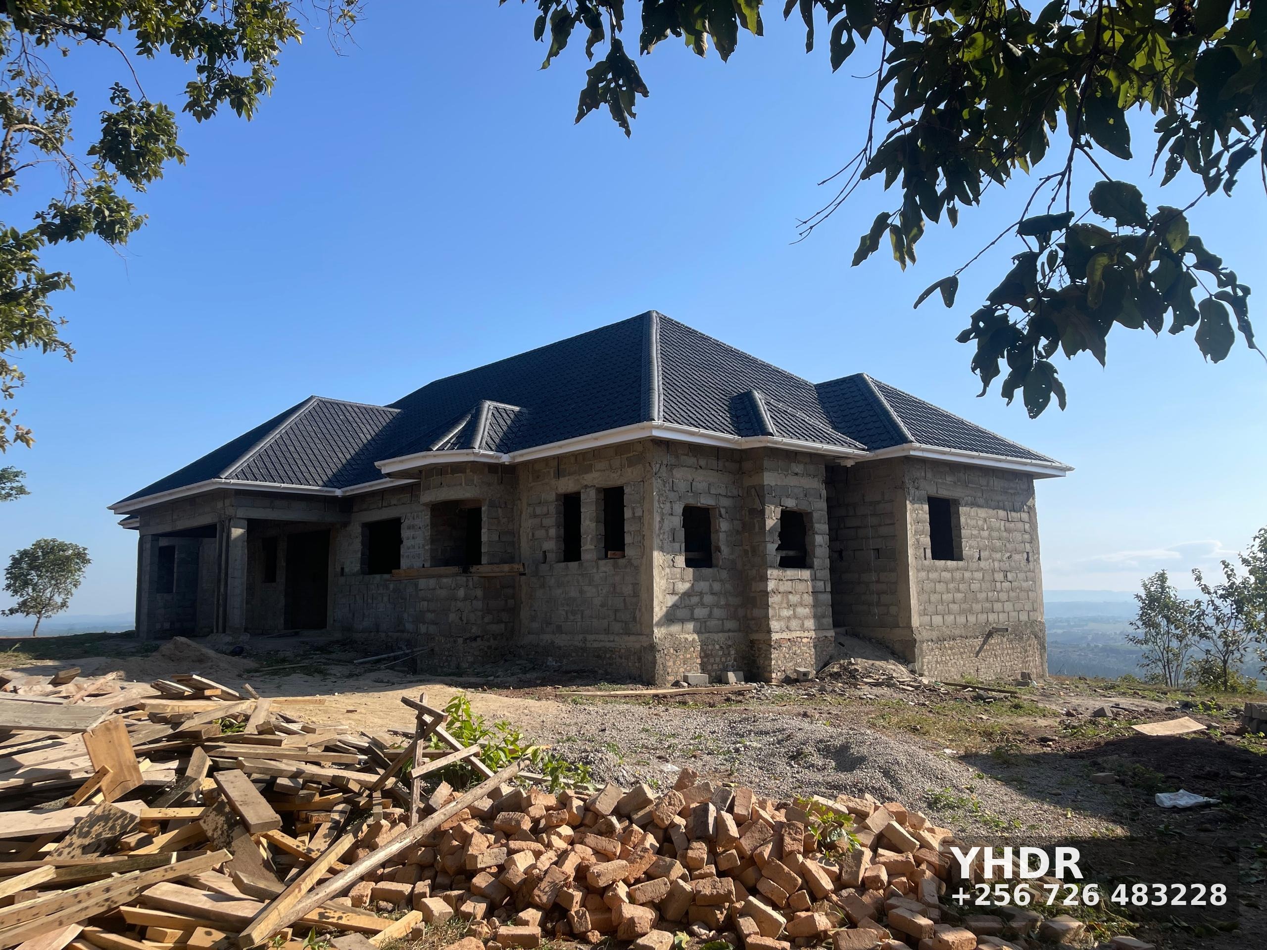 Hillside House Under Construction With Brick And Timber Piles YHDR Builders Uganda Ltd 1 - YHDR Builders Co. Limited